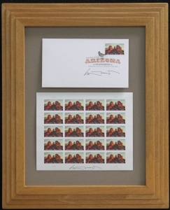 <p>Arizona Centennial Commemorative Stamp, Arizona First Day of Issue by Ed Mell, signed twice with original signature. Custom frame with autographed stamps and First Day of Issue with Signature Frame, Desert tone finish 16 x 13 inches Price $500.00.</p>